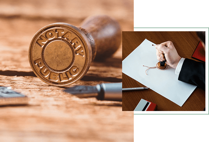 A wooden stamp and a pen on top of paper.